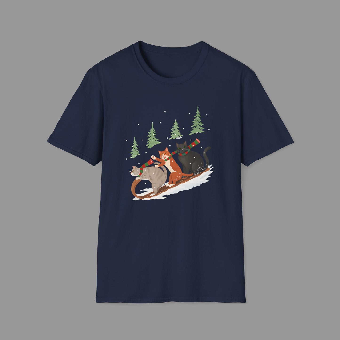 ZALOPA – Winter Cats Christmas T Shirt with Cozy Snowy Forest Scene Playful Sledding Cat Lover Graphic Tee for Holiday Season.