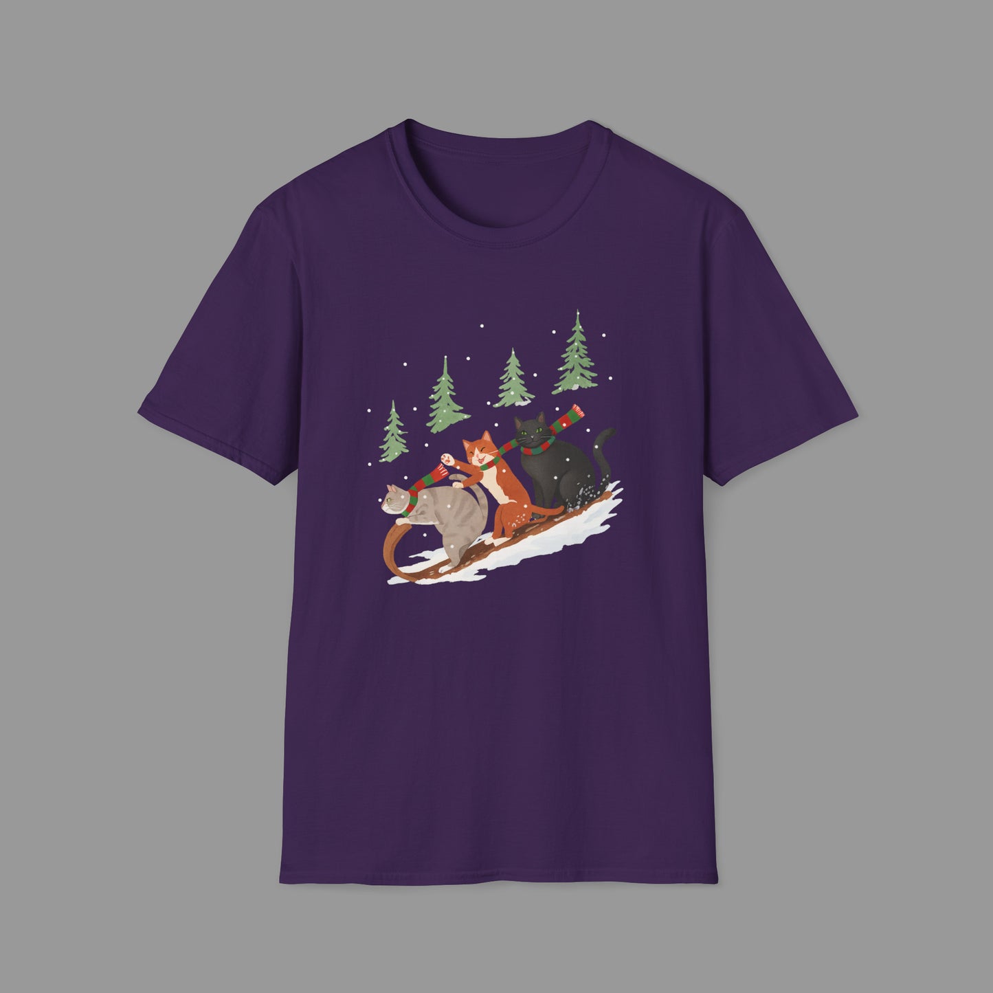 ZALOPA – Winter Cats Christmas T Shirt with Cozy Snowy Forest Scene Playful Sledding Cat Lover Graphic Tee for Holiday Season.