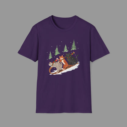 ZALOPA – Winter Cats Christmas T Shirt with Cozy Snowy Forest Scene Playful Sledding Cat Lover Graphic Tee for Holiday Season.