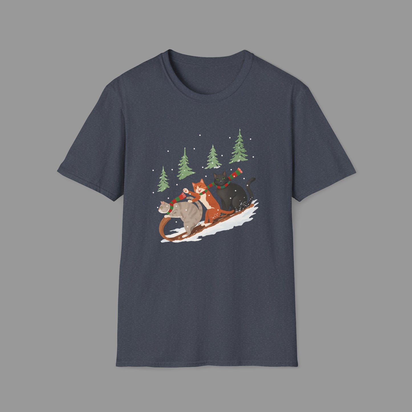 ZALOPA – Winter Cats Christmas T Shirt with Cozy Snowy Forest Scene Playful Sledding Cat Lover Graphic Tee for Holiday Season.