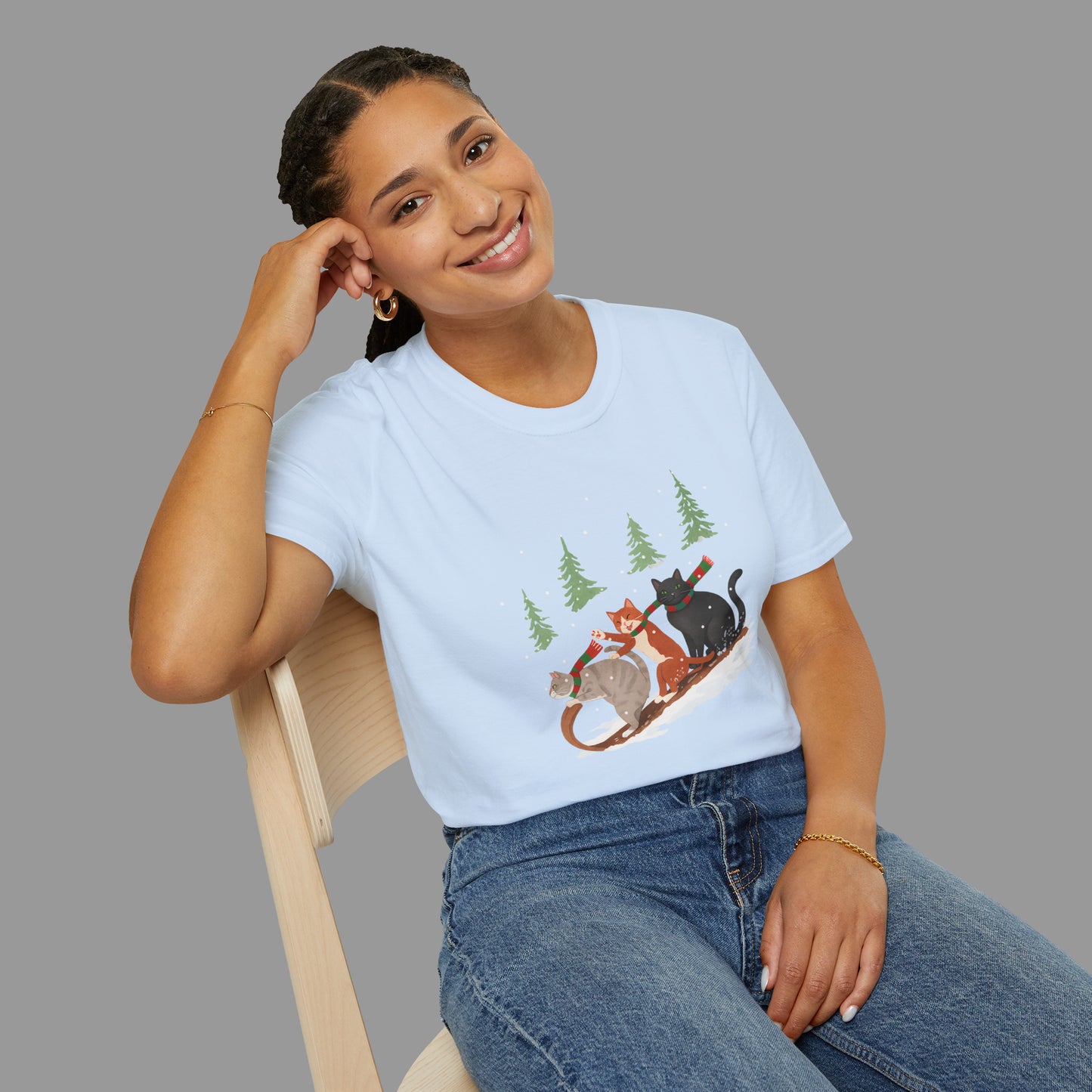 ZALOPA – Winter Cats Christmas T Shirt with Cozy Snowy Forest Scene Playful Sledding Cat Lover Graphic Tee for Holiday Season.